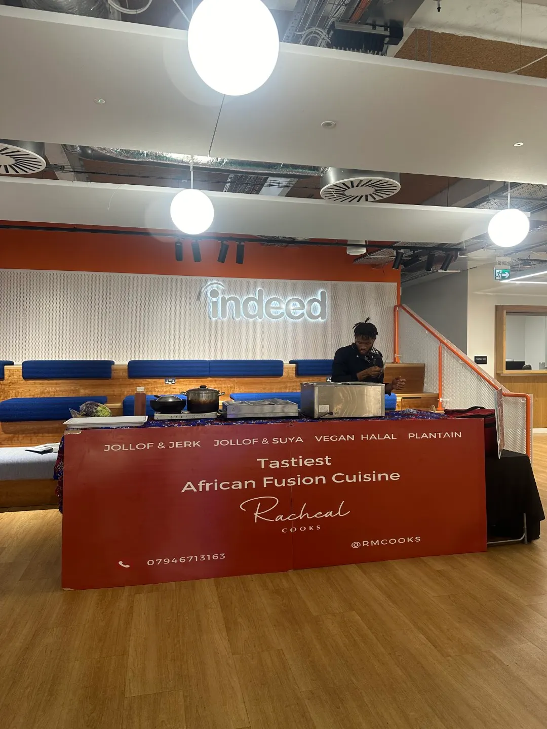 Racheal Cooks serving station at a corporate event