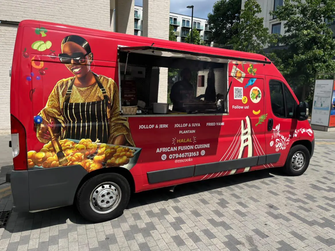 Customers queuing at the Racheal Cooks van